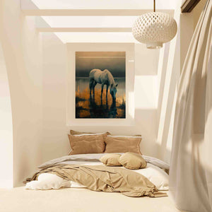 a bedroom with a bed and a painting on the wall