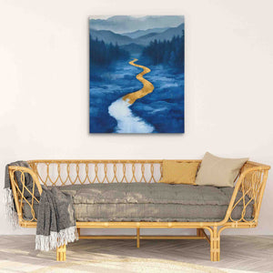 a living room with a couch and a painting on the wall