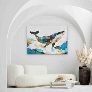 a living room with a white couch and a painting on the wall