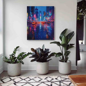 three potted plants sit in front of a painting on the wall
