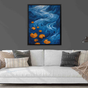 a living room with a couch and a painting on the wall