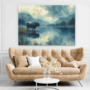 a living room with a couch and a painting on the wall