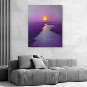 a living room with a couch and a painting on the wall