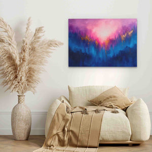 a living room with a couch and a painting on the wall