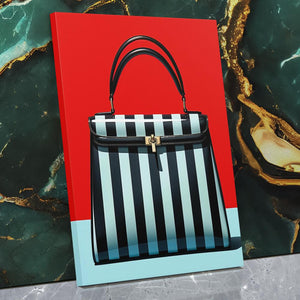 a black and white striped purse sitting on top of a table