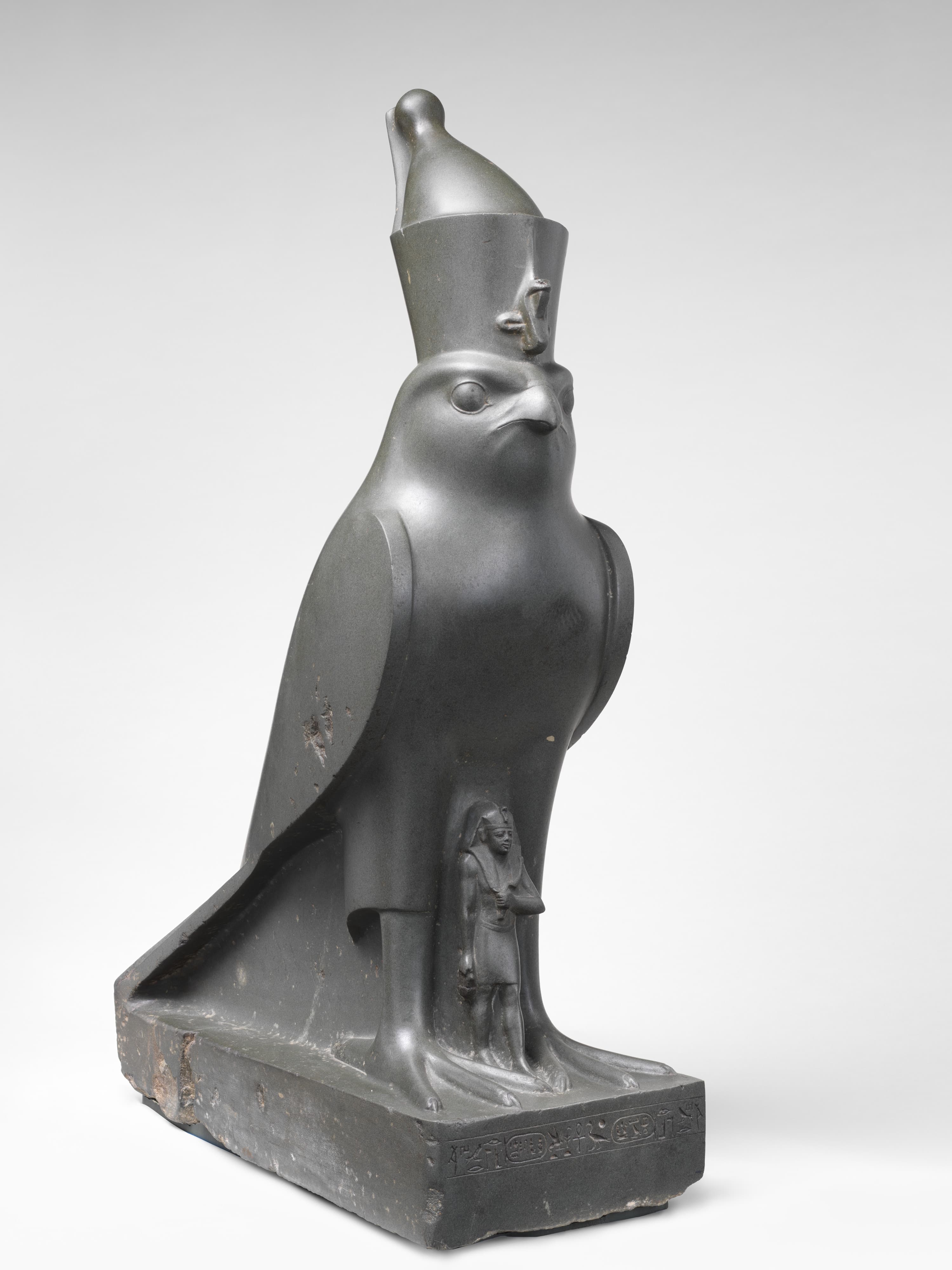 Statue of Horus as a falcon protecting King Nectanebo II by Ancient Egyptian (Unknown)