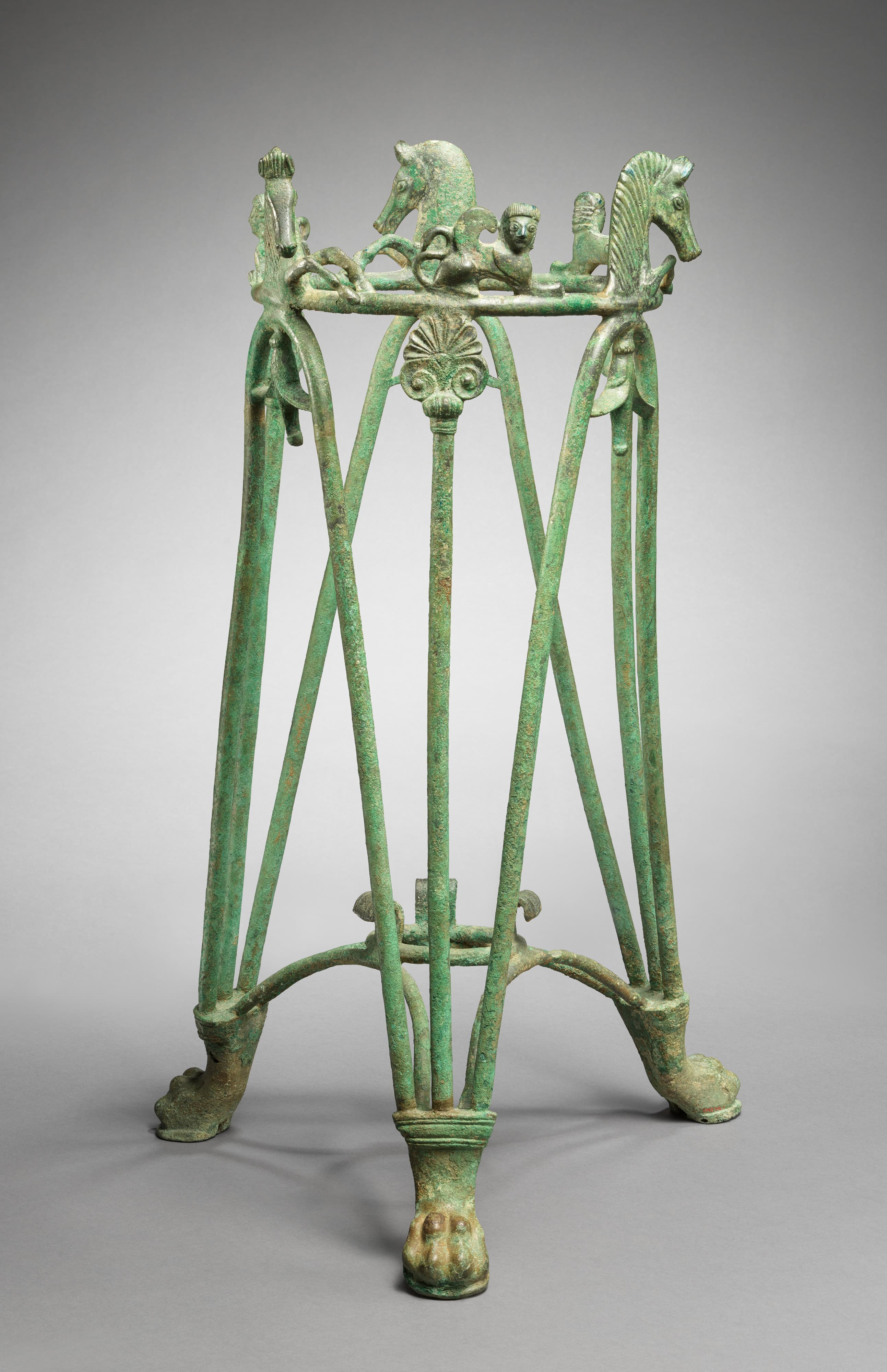 Bronze rod tripod stand by Ancient Greek (Unknown)