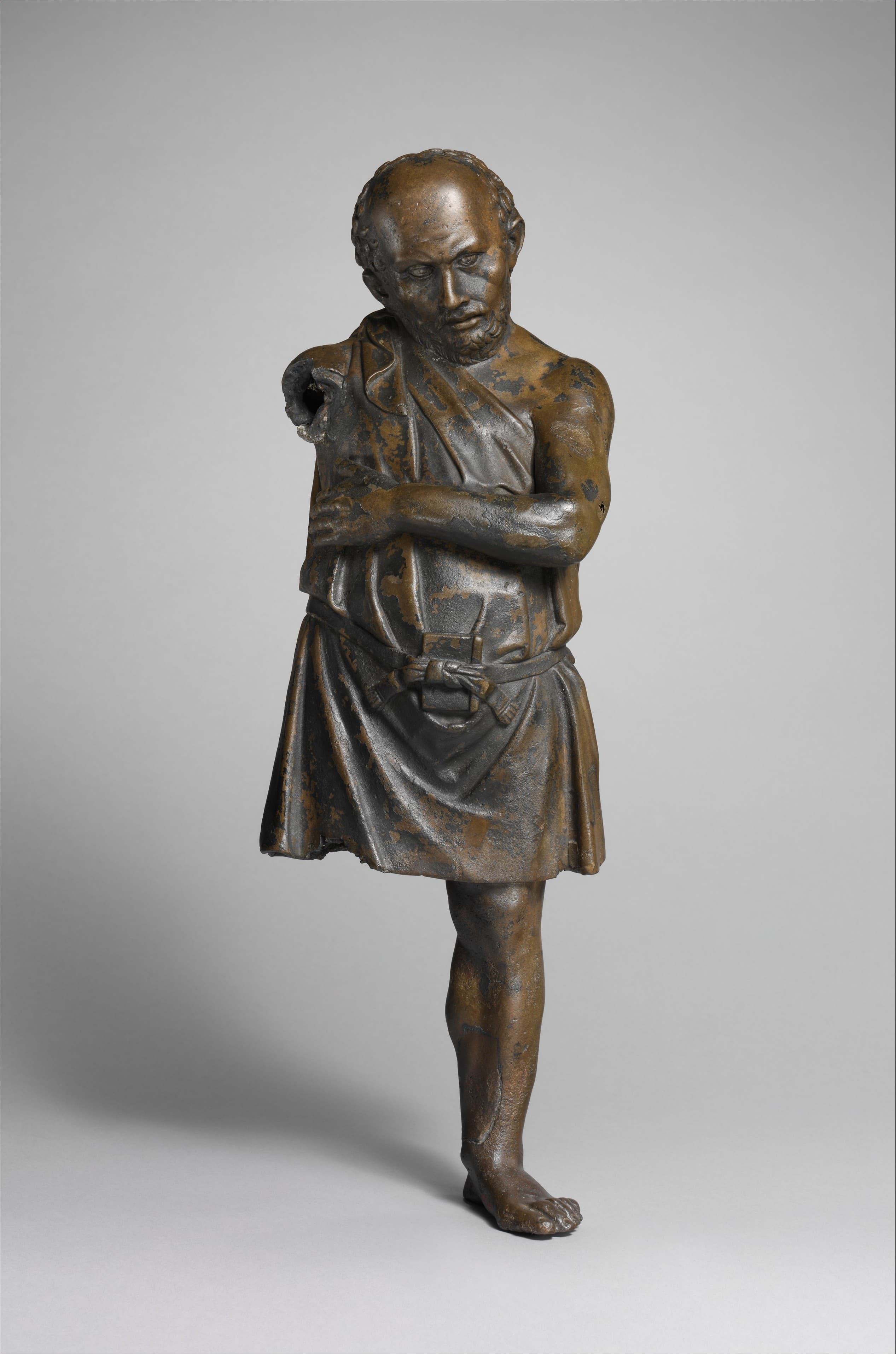 Bronze statuette of an artisan with silver eyes by Ancient Greek (Unknown)