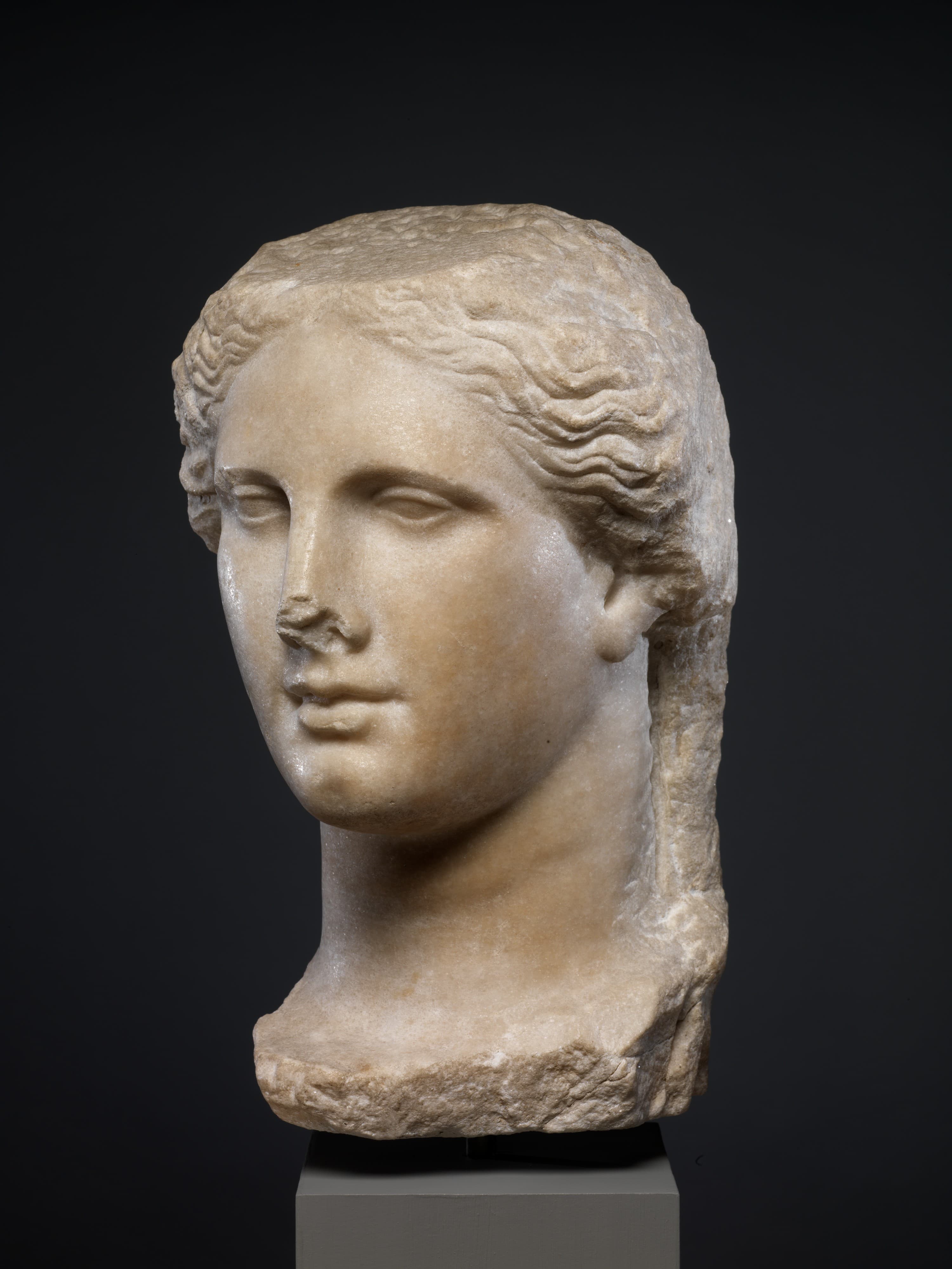 Marble head of a goddess by Ancient Greek (Unknown)
