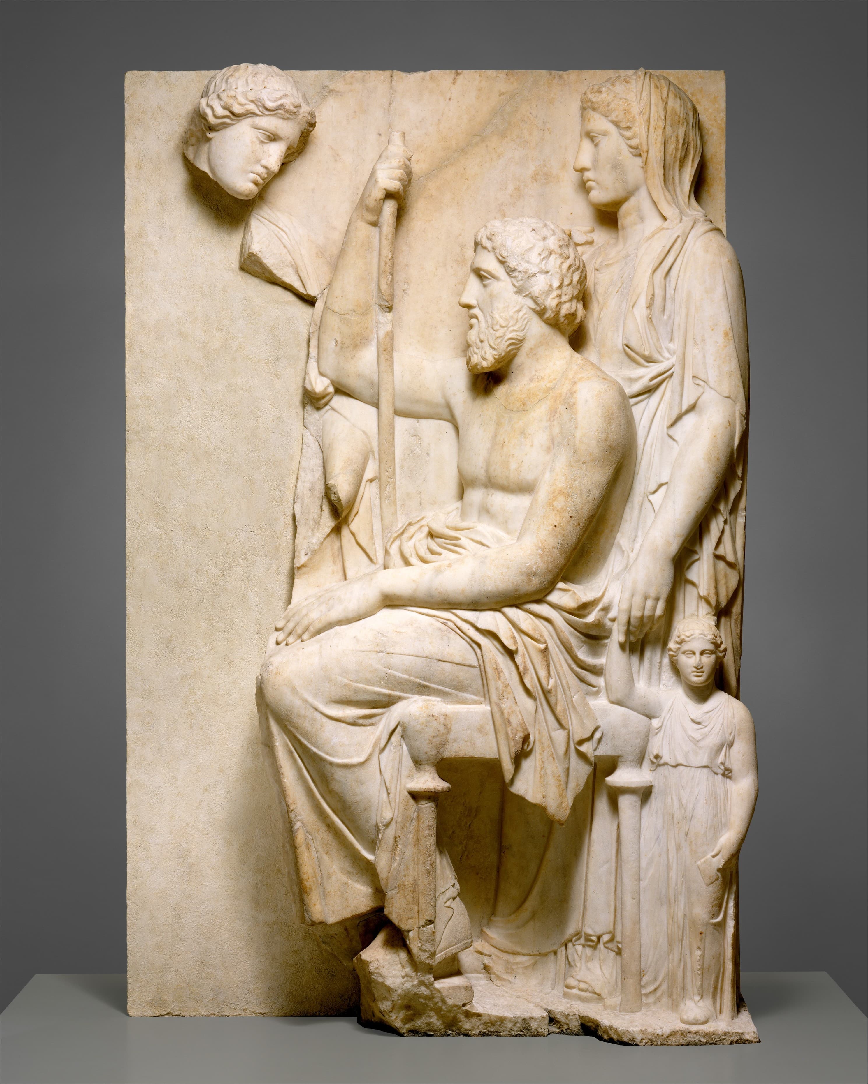 Marble grave stele with a family group by Ancient Greek (Unknown)