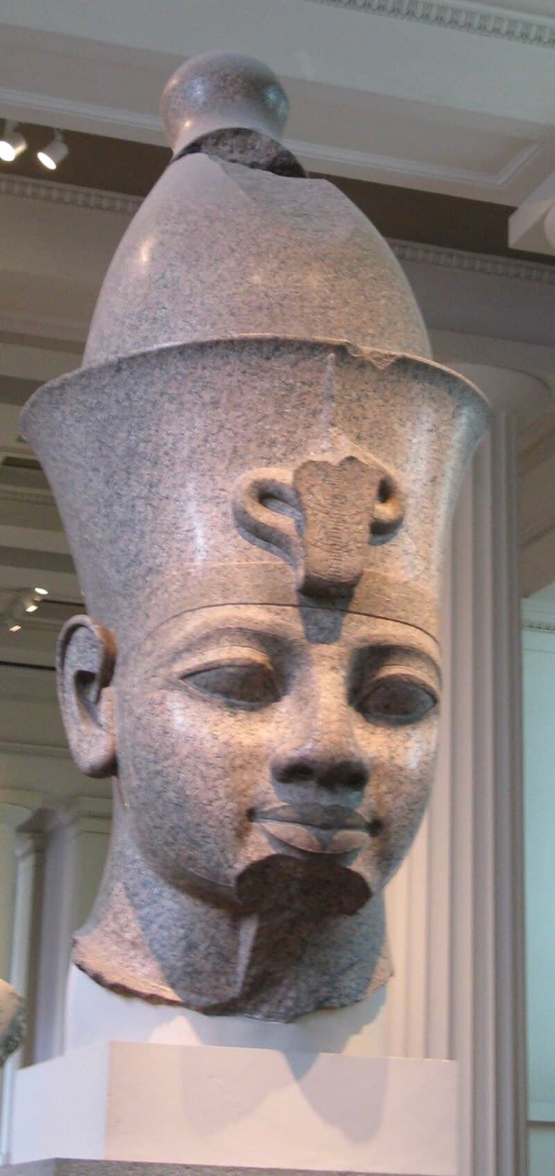 Colossal Head of Amenhotep III by Ancient Egyptian (Unknown) (-1350), Red granite at British Library, London