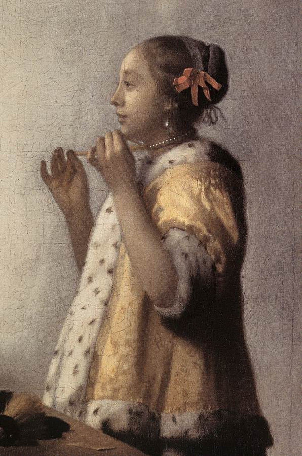 Young Woman with a Pearl Necklace by Johannes Vermeer (1664) at Gemäldegalerie, Berlin