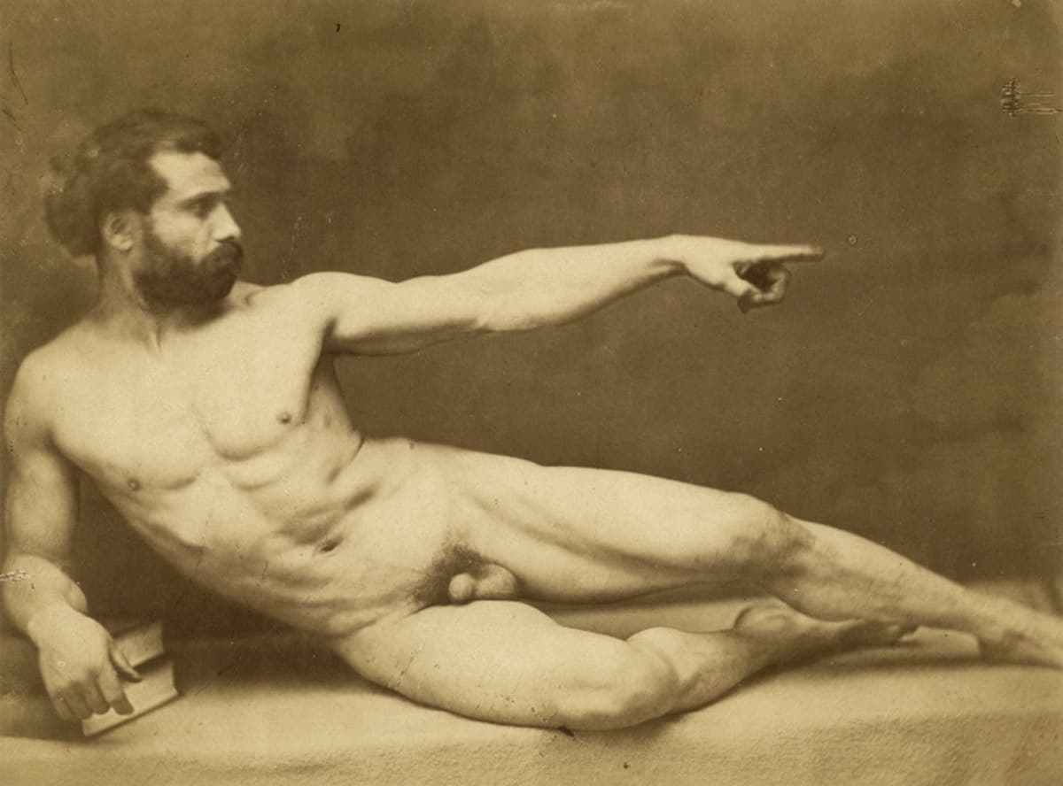 Male nude and arm of bearded man by Michelangelo