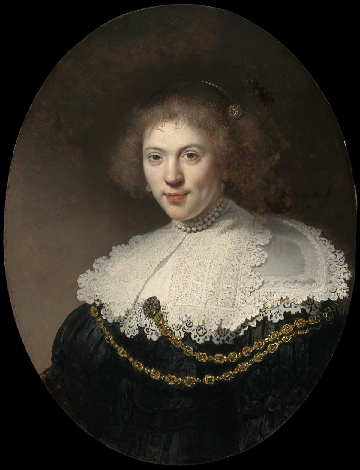 Woman Wearing a Gold Chain by Rembrandt van Rijn