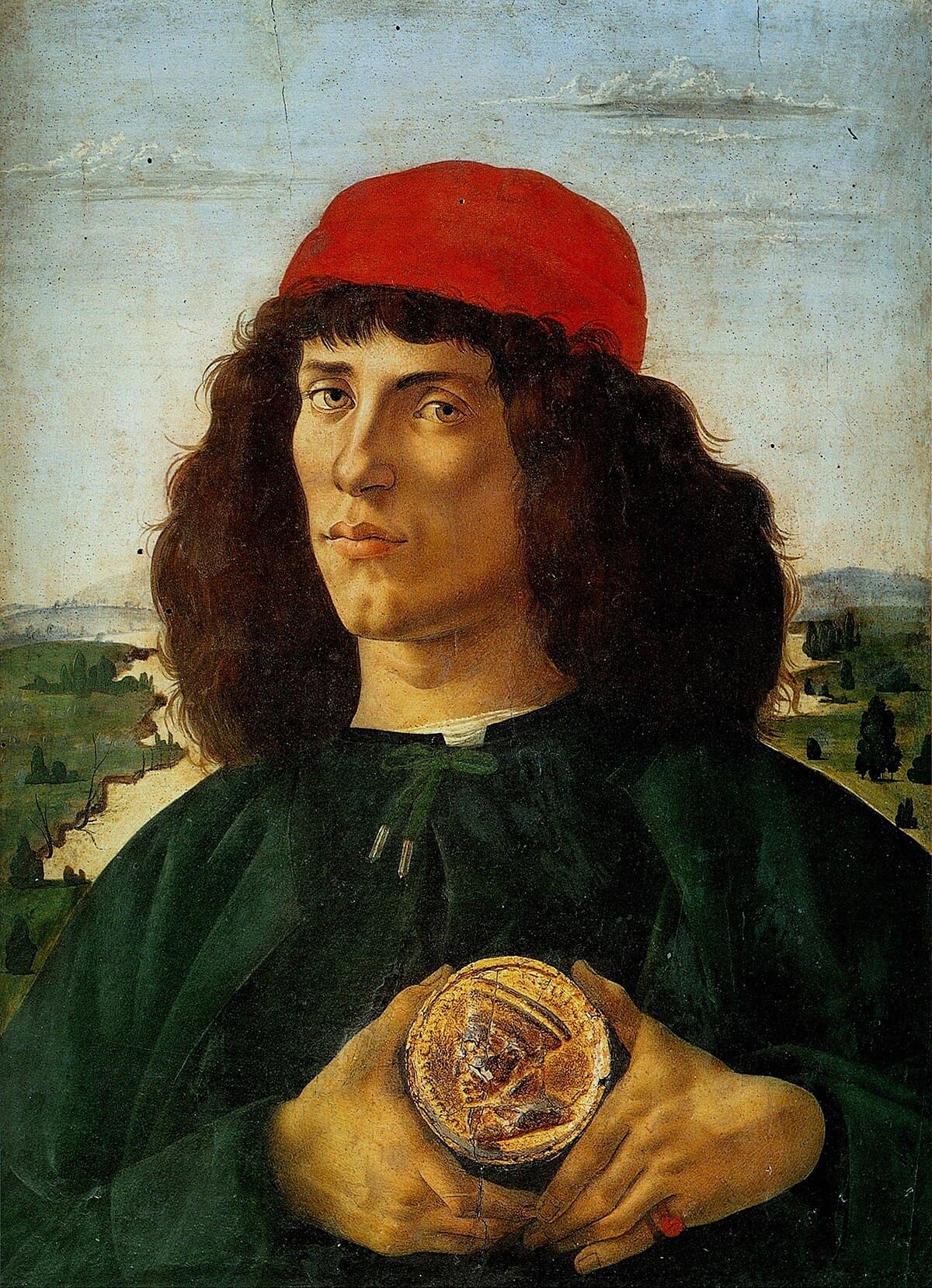 Portrait of a Man with the Medal of Cosimo by Sandro Botticelli at Uffizi Gallery, Florence