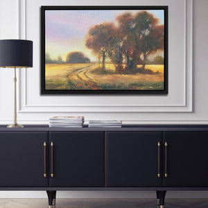 a painting hanging on a wall above a sideboard