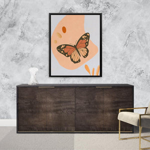 a picture of a butterfly on a wall above a dresser