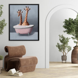 two giraffes are sitting in a bathtub