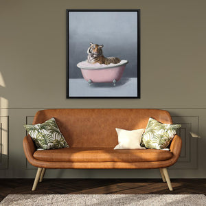 a cat sitting in a pink bath tub