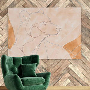 a green chair sitting in front of a painting on a wall