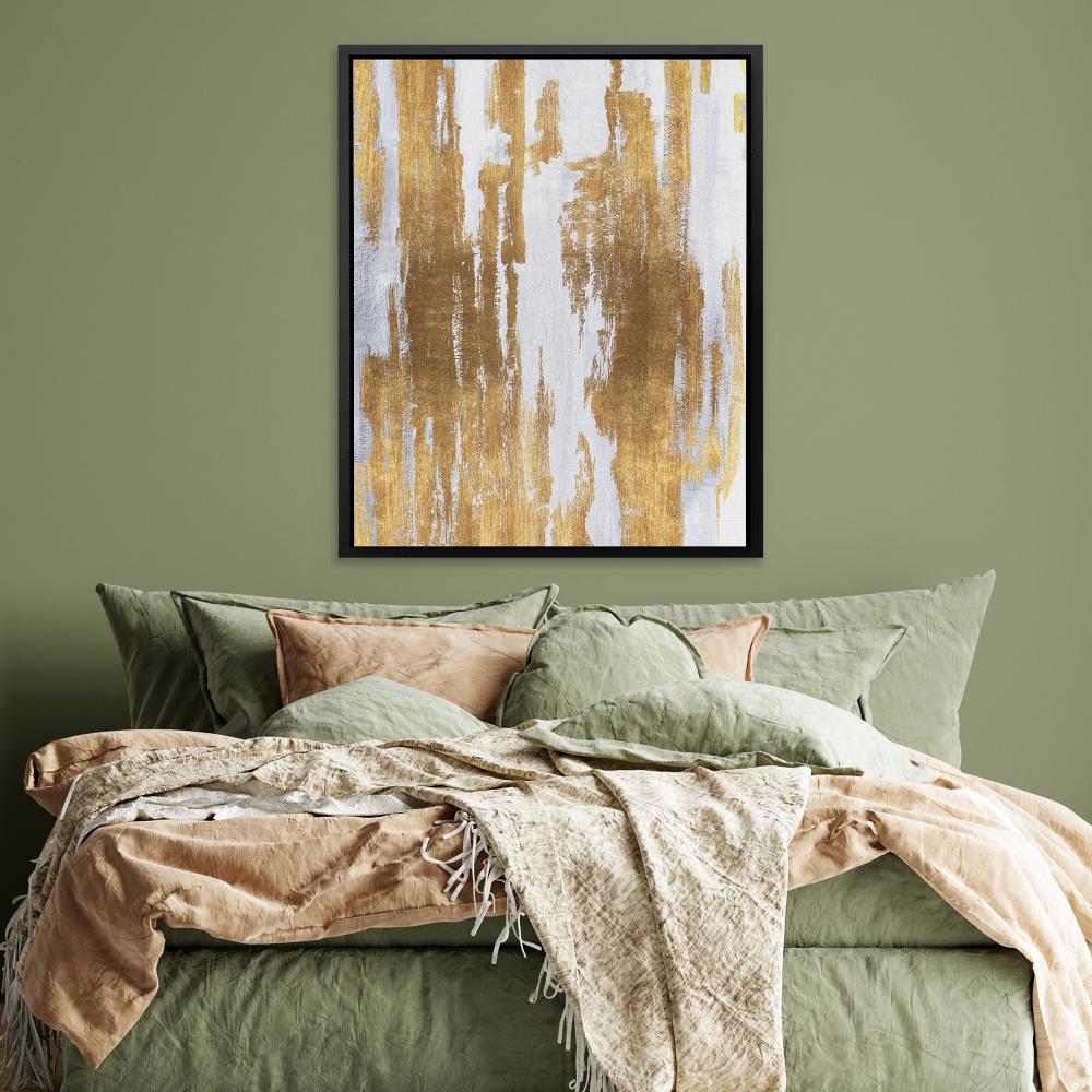 a gold and white abstract painting on canvas