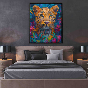 a painting of a leopard on a wall above a bed