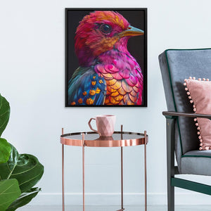 a colorful bird sitting on top of a table