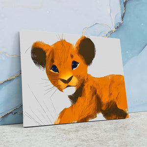 a picture of a lion cub on a canvas