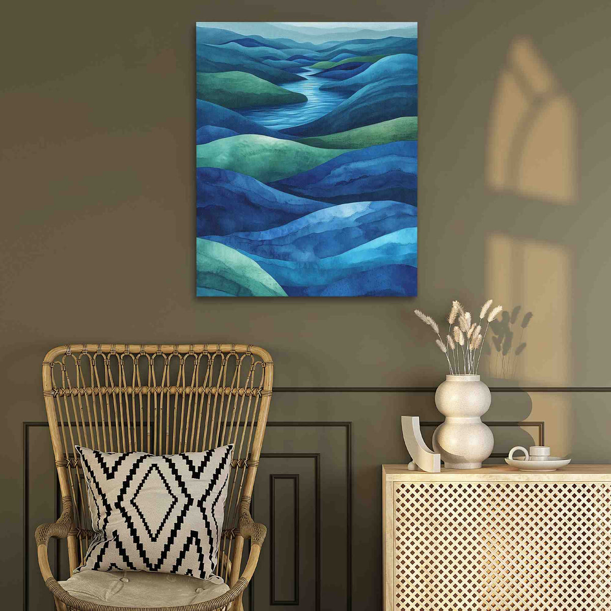 a room with a wicker chair and a painting on the wall