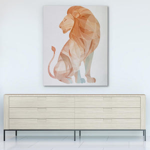 a picture of a lion on a wall above a dresser