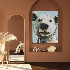 a painting of a bear on a wall next to a mirror