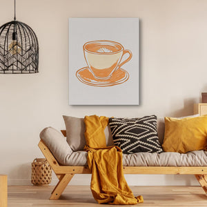 a living room with a couch and a coffee cup on it