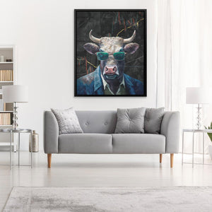 a living room with a couch and a painting of a cow