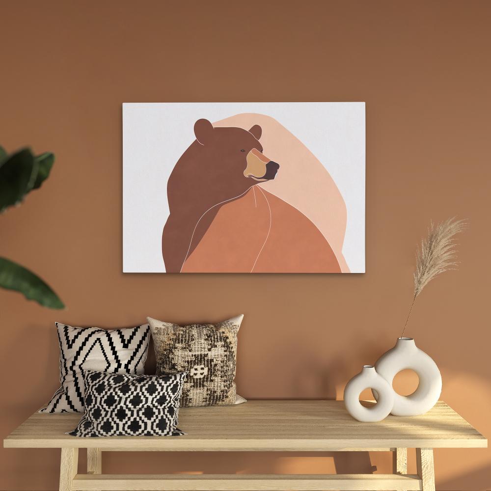 a painting of a brown bear on a white wall