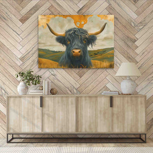 a painting of a bull is hanging on a wall