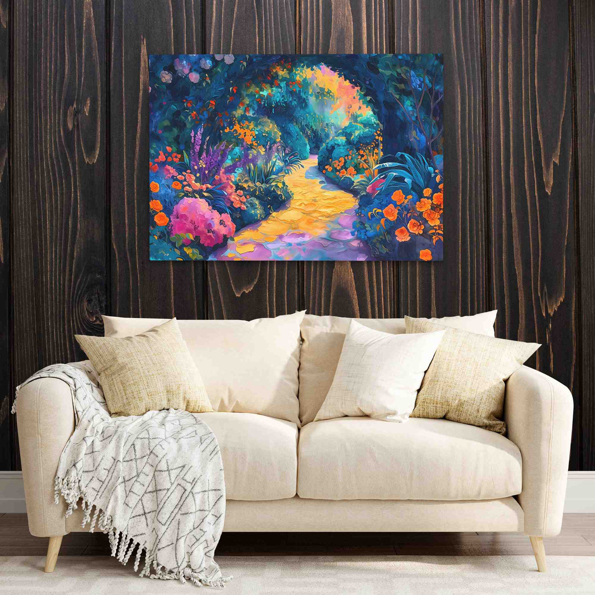 a living room with a couch and a painting on the wall