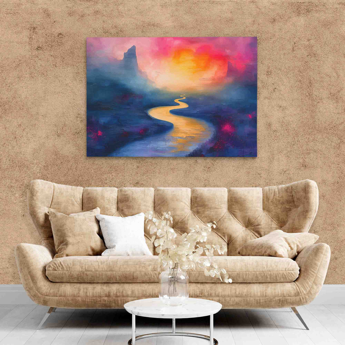 a living room with a couch and a painting on the wall