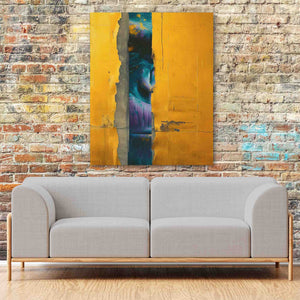 a couch in front of a brick wall with a painting on it
