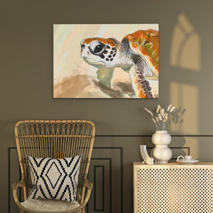 a painting of a turtle on a wall next to a chair