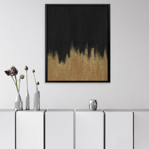 a picture of a black and gold painting on a wall