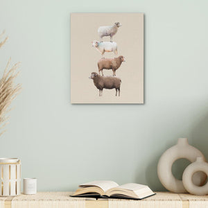 three sheep standing on top of each other on a shelf