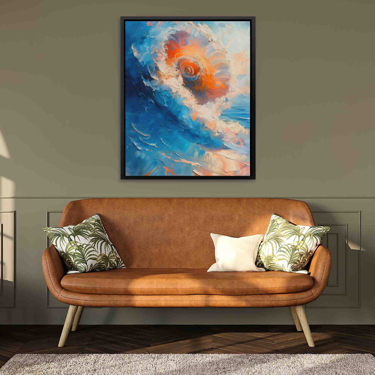 a living room with a couch and a painting on the wall