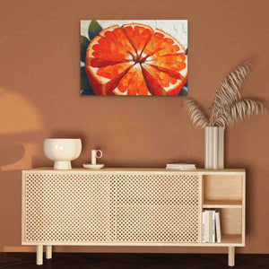 a painting of an orange on a wall