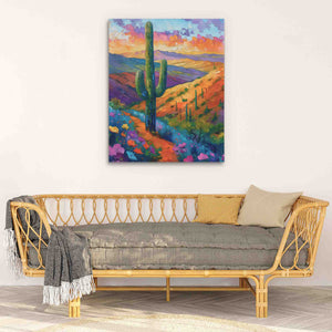 a painting of a cactus on a wall above a couch