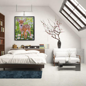 a bedroom with a bed and a painting on the wall