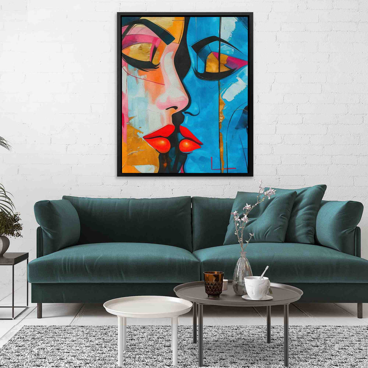 a living room with a blue couch and a painting on the wall