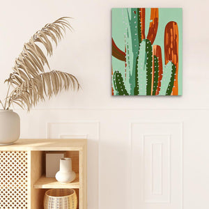 a painting of a cactus on a wall