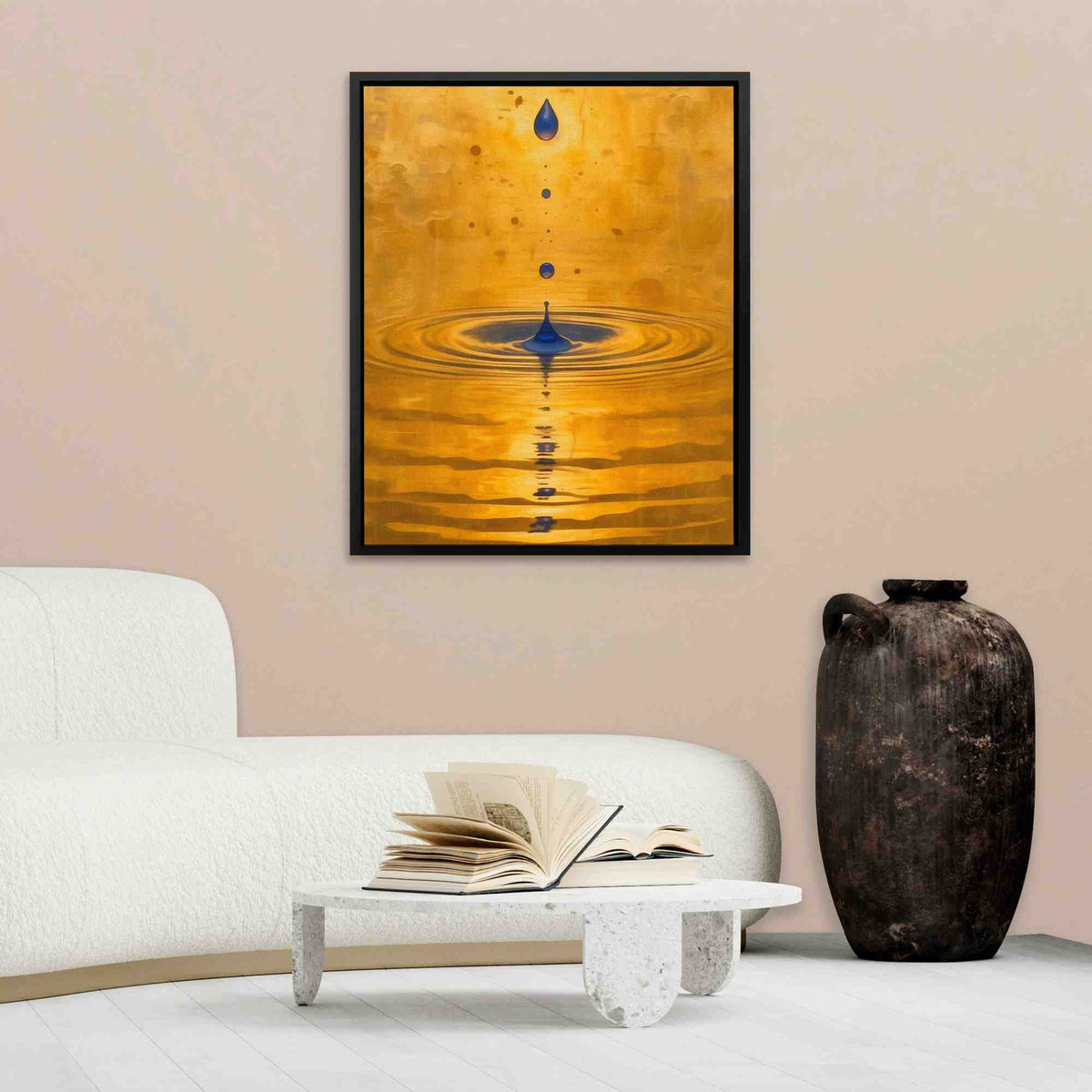 a living room with a white couch and a painting on the wall