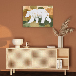 a painting of a white bear on a brown wall