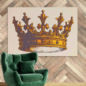 a green chair in front of a wall with a gold crown on it